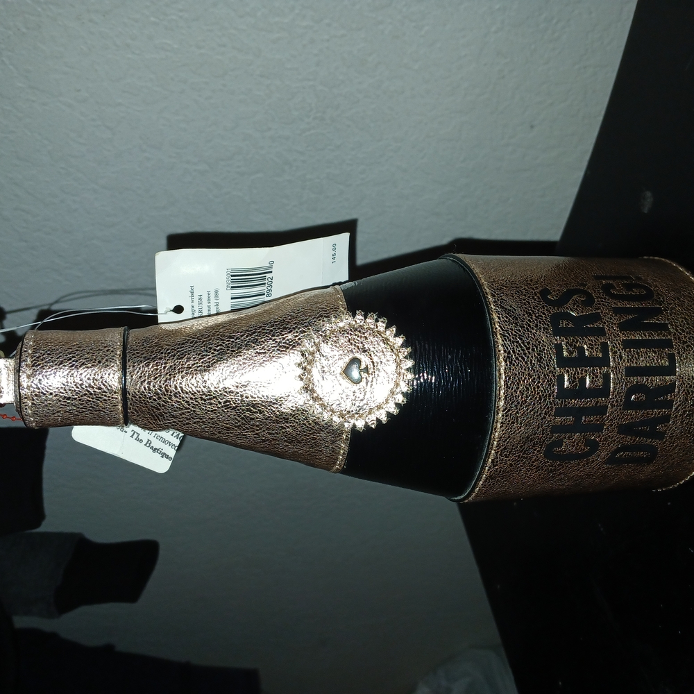 Gold and Black Satchel Bag with Elegant Design